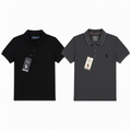 Two Polo Ralph Lauren short-sleeve polo shirts shown side by side on a white background: one white with black piping and a black embroidered pony logo, and one dark gray with white piping and a small dark logo.